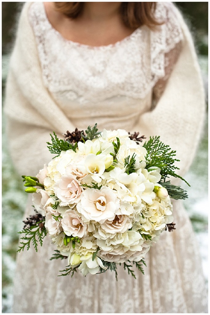 A rustic vintage winter wedding Loving the use of the pine cones in the 