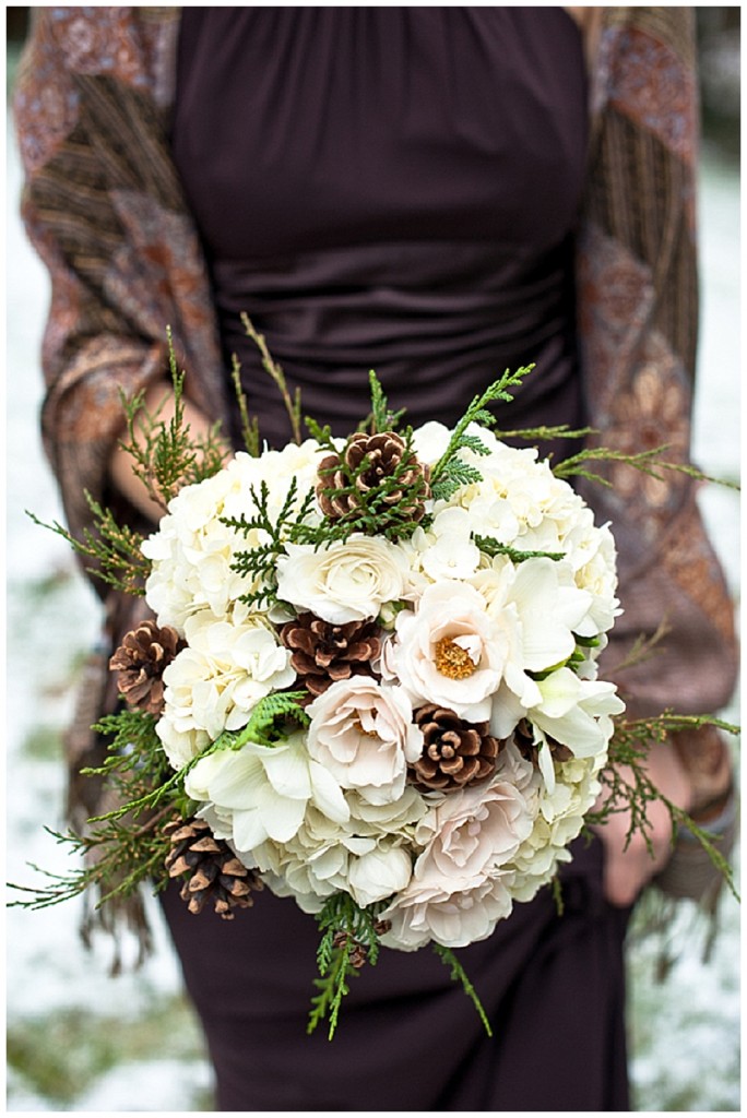Loving the use of the pine cones in the wedding bouquets too A rustic 