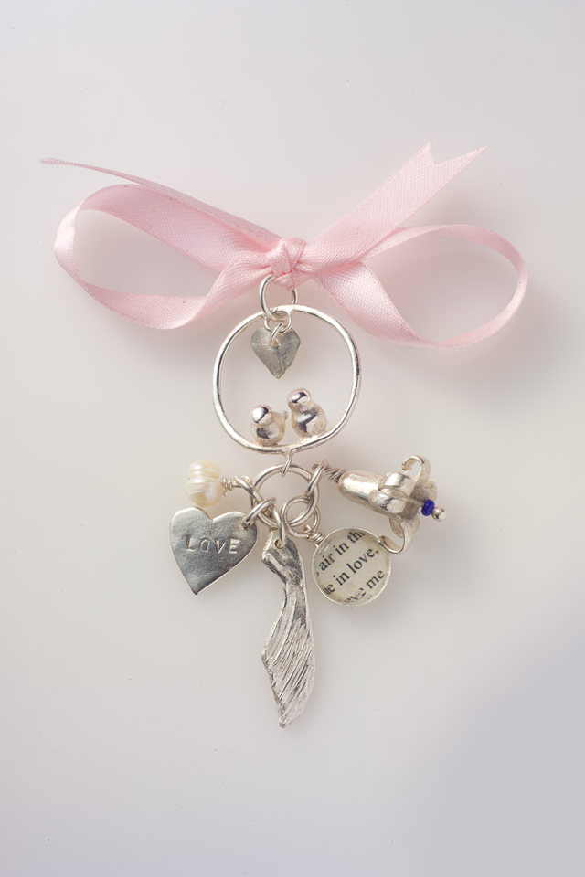 Charm cluster broach pendant on ribbon