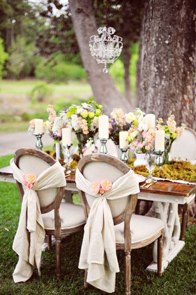 Stylish | Alternative Wedding Chairs: Ideas + Inspiration draped material and flower chair cover